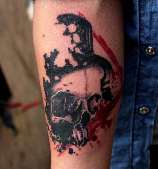 abstract skull tattoo design black and red male hand forearm