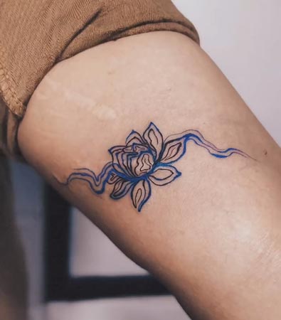 lotus fluid tattoo abstract male bicep