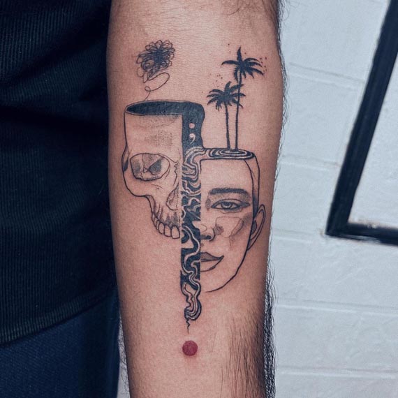 split face beach abstract liquid flow tattoo male forearm