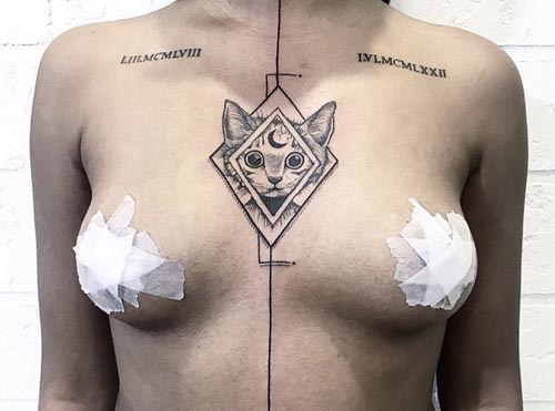 abstract cat tattoo design on chest