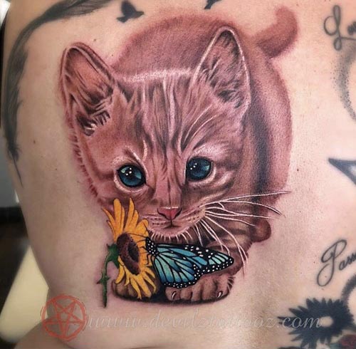 cute pink color kitten tattoo