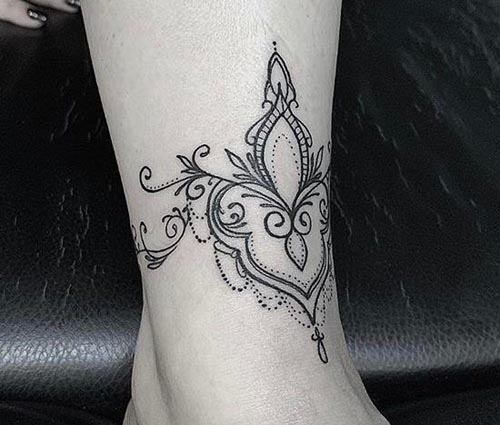 creative design tattoo on ankle