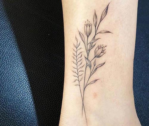 flower and leaves tattoo