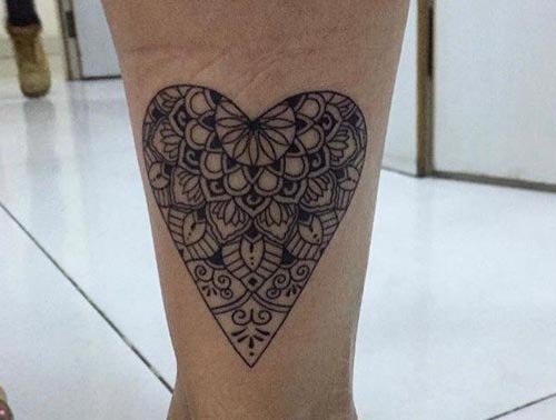 heart tattoo with abstract designs