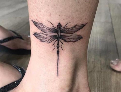intricate lines fly tattoo