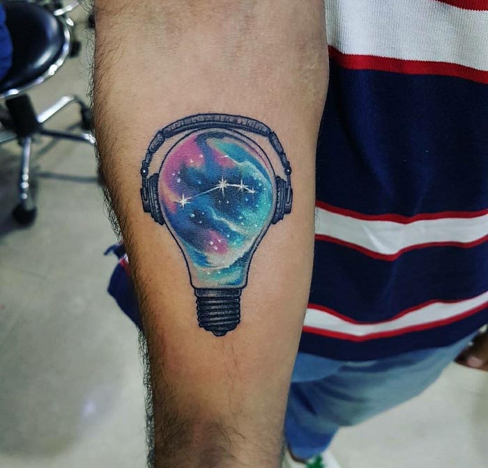bulb with headphone tattoo