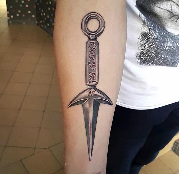 dagger tattoo design on arm