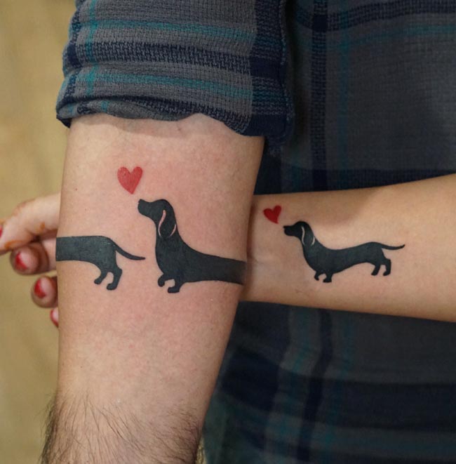 dachshund dog silhouette red heart armband tattoo male forearm