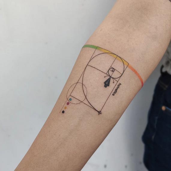 golden ratio fibonacci spiral geometric armband tattoo minimal color female forearm