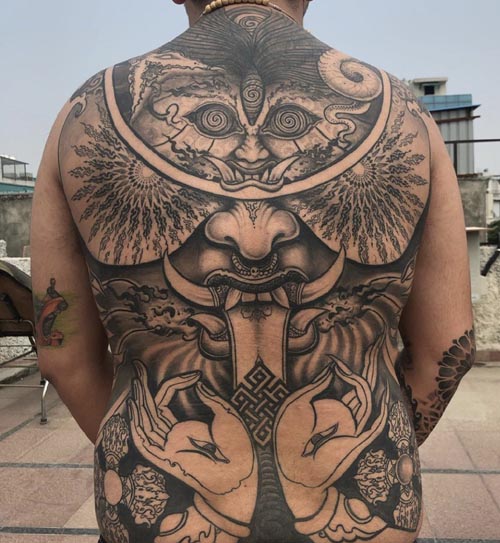 abstract full back tattoo