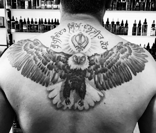 flying eagle tattoo on back