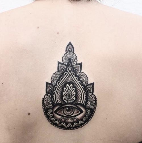 mandala eye tattoo on back