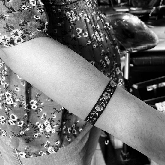 armband floral tattoo design female forearm minimalist