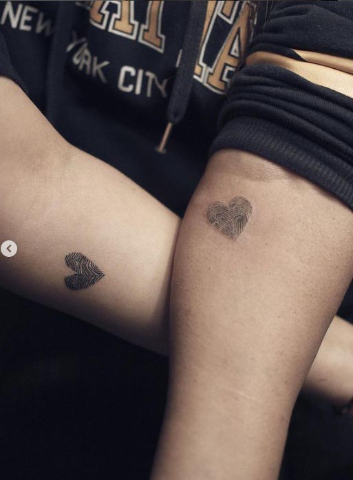 fingerprint heart tattoo