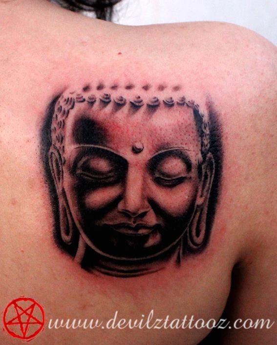 buddha tattoo on back shoulder
