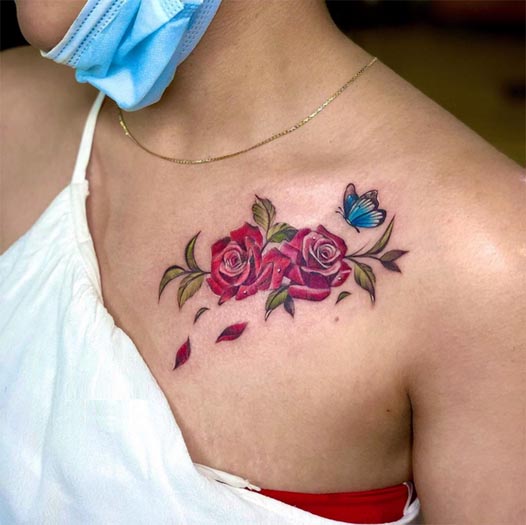 2 red roses and blue butterfly green leaves tattoo design female collarbone