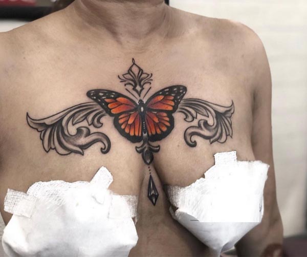 butterfly flowers jewellery pendant tattoo female chest sternum