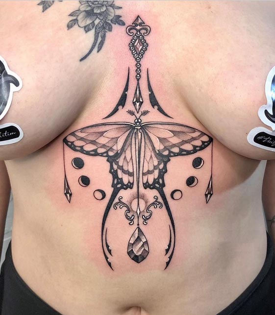 butterfly jewel ornamental phases of moon tattoo design female sternum