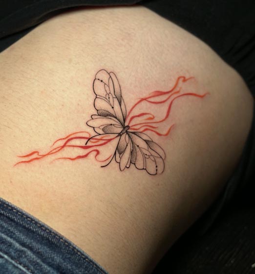 butterfly on liquid flow background fine line female ribs tattoo