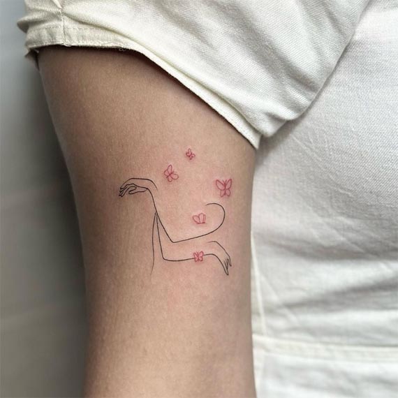 minimalist line art lady figure with 5 butterfly tattoo girl bicep
