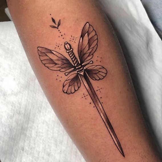 sword with butterfly wings ornamental touch tattoo design male hand forearm