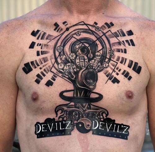 creative art tattoo design on chest