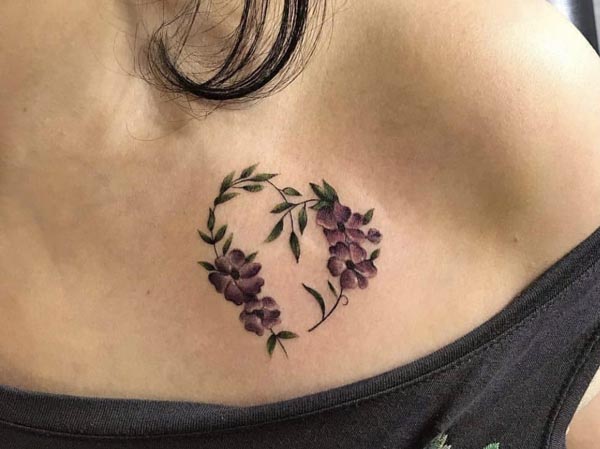flower heart shape tattoo on chest