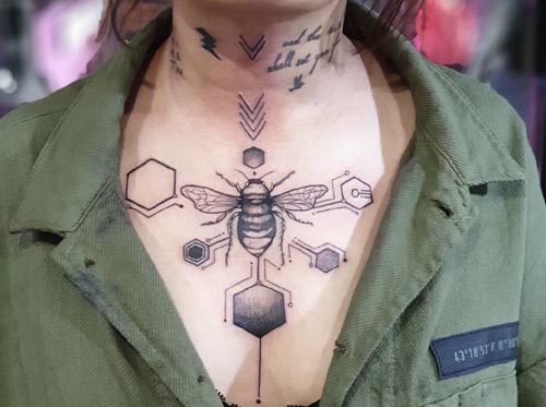 honey bee with geometric art tattoo