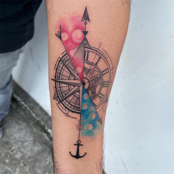 compass clock anchor directional arrow watercolor splash pink blue tattoo male forearm