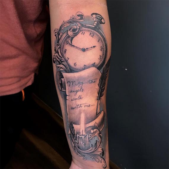 pocket watch clock candle feather quill scroll quote ornamental leaves tattoo male forearm