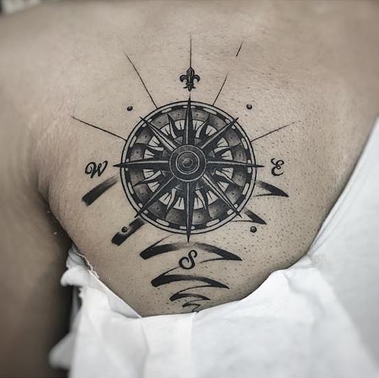 circular-compass-dial-cardinal-directional-symbols-tattoo-design-male-chest