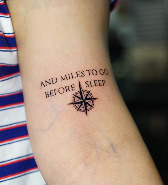 compass-navigation-symbol-inspirational-quote-lettering-tattoo-female-arm