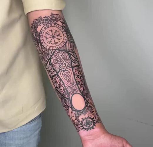 nordic-compass-celtic-knots-patterns-viking-inspired-motifs-shield-like-tattoo-design-male-forearm