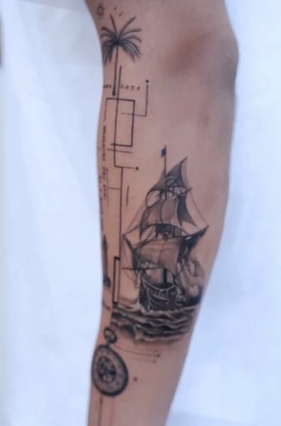 sailing boat compass ocean waves palm tree geometric lines tattoo male outer forearm