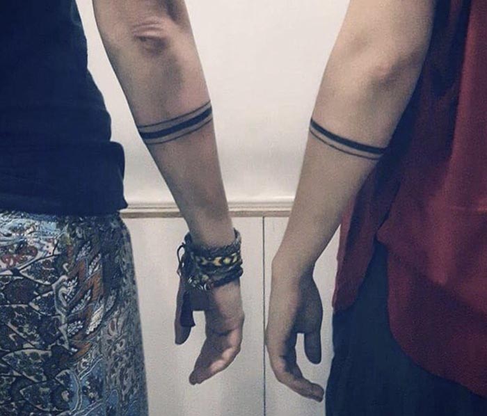 18 Beyond Romantic Couple Tattoos