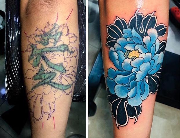 symbol cover up tattoo blue color flower arm