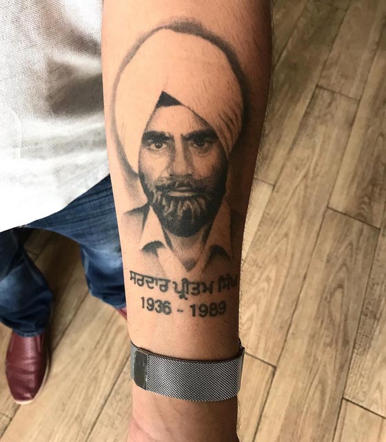 Sidhu Moose Wala's Father Tattoos His Son's Face On His Arm