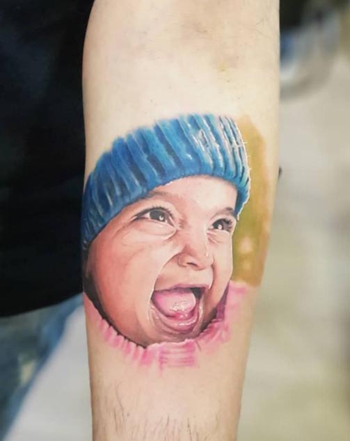 daughters colorful portrait tattoo