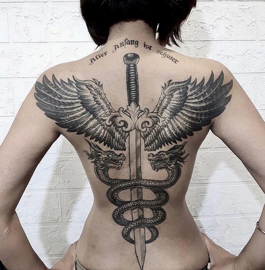 doctors symbol wings sword dragons tattoo female full back