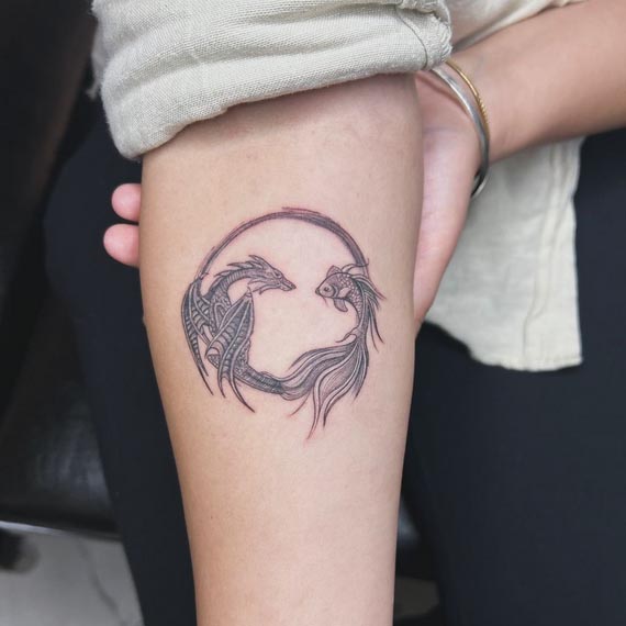 dragon fish circular tattoo design female forearm