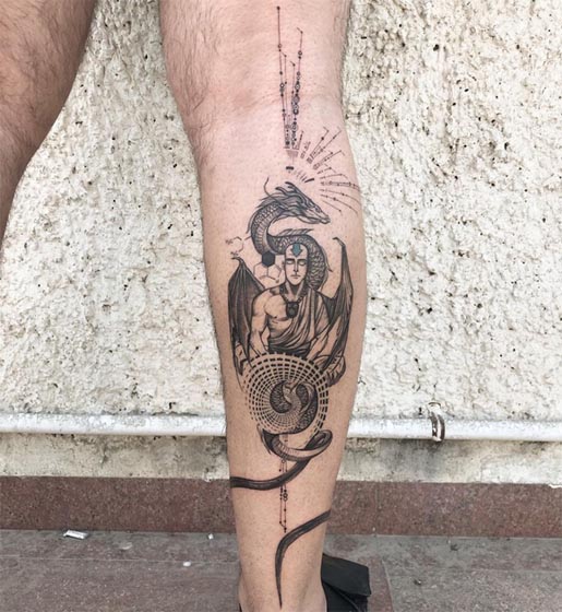 meditating monk dragon with geometric pattern tattoo male leg calf