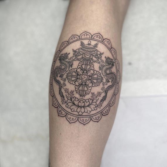vajra dragon flower tattoo tibetan style tattoo male forearm