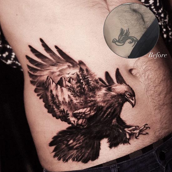 eagle and forest nature in wings tattoo male stomach