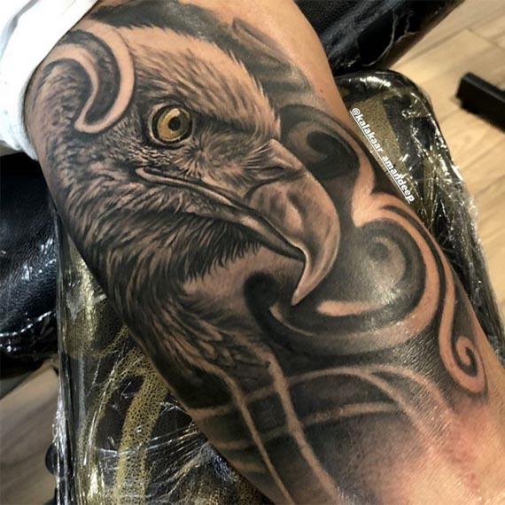 eagle tattoo design male hand bicep black and grey