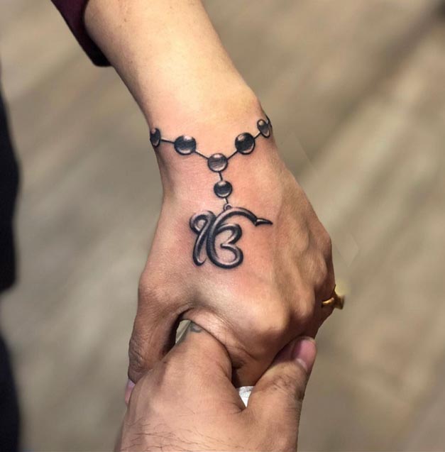 ek onkar rosary bracelet tattoo designs female wrist