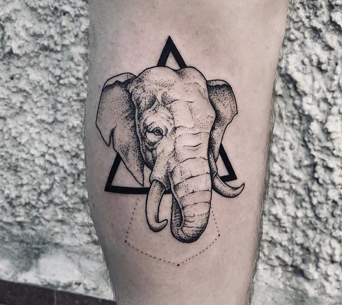 dotwork elephant tattoo on calf
