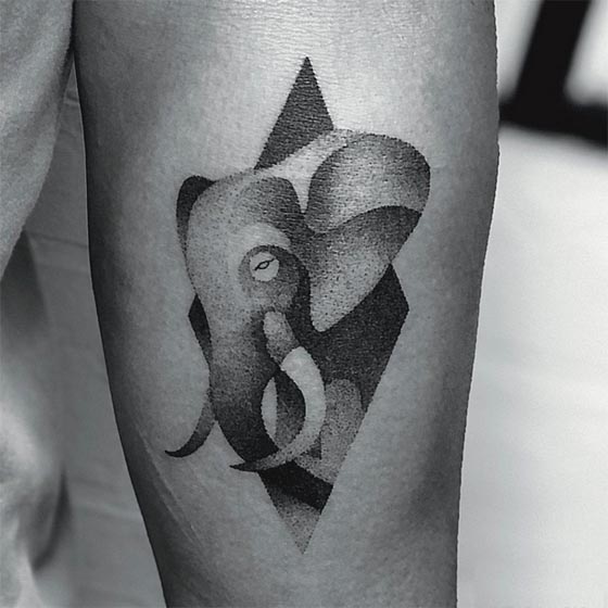elephant head on diamond shape tattoo design dotwork male forearm