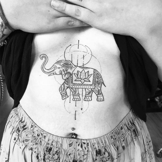 elephant mehndi style geometric pattern tattoo design female stomach