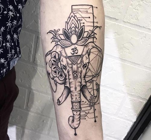 geometric elephant with 1 broken tooth lotus on head cyberpunk at back tattoo forearm