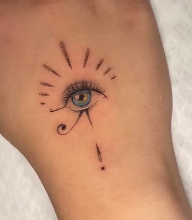 eye of ra tattoo design female hand